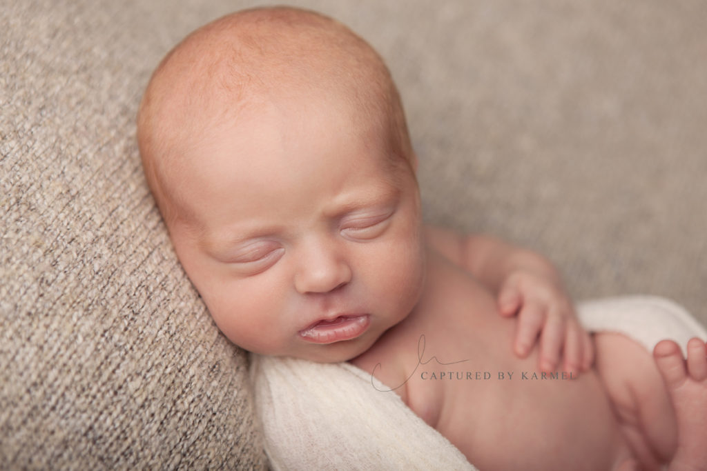 baby sleeping peacefully for photo session